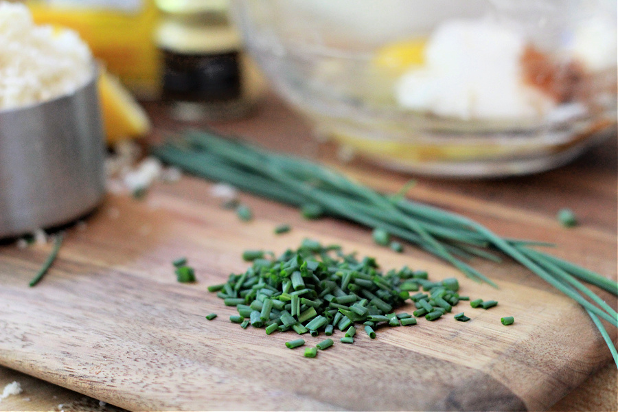Fresh chives for classic crab cakes recipe