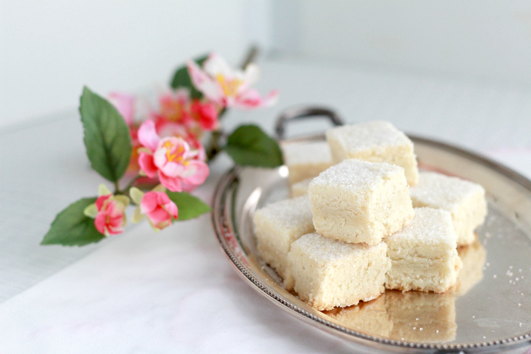 Call them biscuits or cookies, shortbread are delicious morsels of crumbly, buttery and delicate sweetness. Easy recipe for classic treats drizzled with or without lemon glaze.