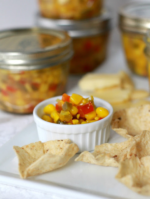 A great salsa-like appetizer with chips or side for burgers and hotdogs, corn relish canning recipe is easy and tasty!