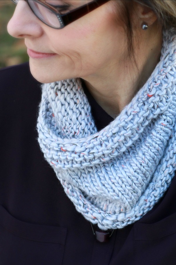 Keep warm and snugly this fall with a stylish knitted cowl. Cute pattern that is easily modified for many different looks. A great beginner knitting project.