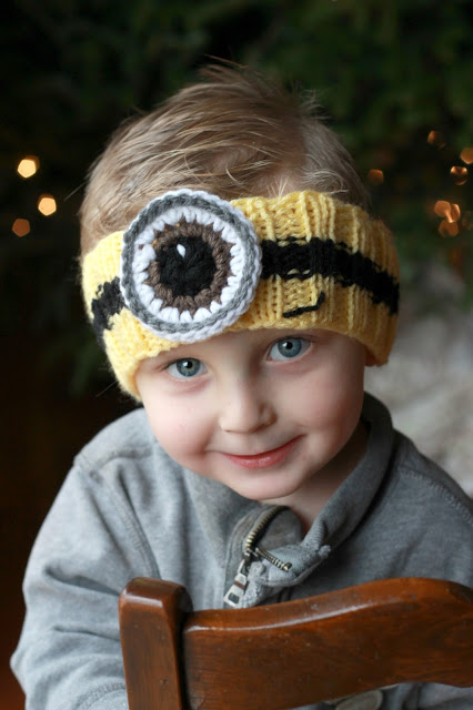 Adorable and easy knitted headband FREE pattern with crocheted eye keeps those little ears warm in a fun way.
