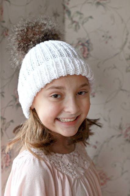 Make your own faux fur pom poms for hats and crafts easily and inexpensively. Check out this tutorial, How-to Faux Fur Pom Pom on Knitted Toque with link to easy knitted hat pattern.