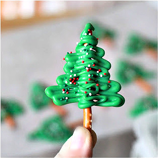 Making melted chocolate Christmas tree cupcake toppers