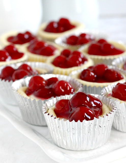 Looking for a delicious and easy to make dessert? Try Cherry Cheese Cupcakes. They are always a favorite and look so pretty. Perfect for bridal or baby showers, parties and holidays like Valentine's Day. Top with pie filling of choice. Easy to serve with no slicing too. 