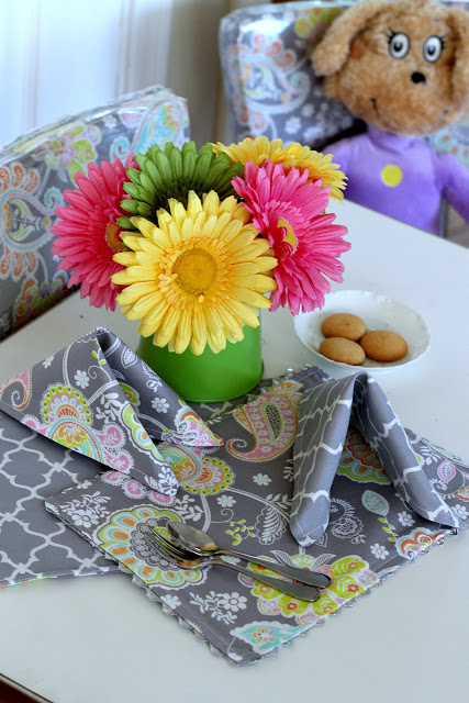 Easy sewing project of reversible kid-sized place mats and cloth napkins for child's table and chair kitchen set