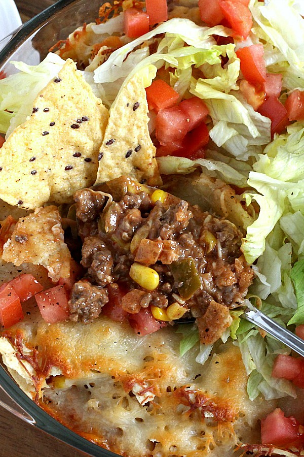 Beef nacho casserole is loaded with meat, corn, salsa, cheese, tortilla chips and spices for great tasting dinner everyone will love!