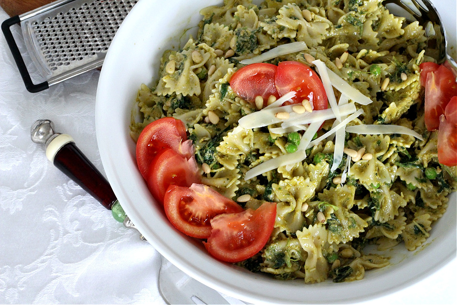 Pasta Pesto and Peas is full of summer flavors with garden-fresh ingredients like basil, garlic, sweet peas, and spinach. Great for patio parties, potluck dinners, a hearty lunch or dinner meal. 