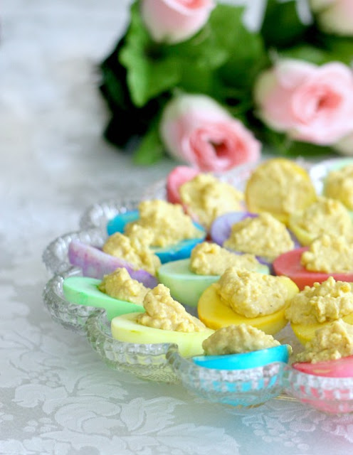 Classic Deviled eggs recipe in dyed egg whites for lovely pastel shades that look beautiful for Easter dinner.
