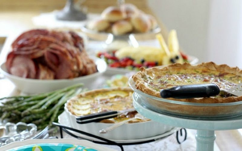 A lovely Easter brunch menu includes baked ham with pineapple glaze, quiche Lorraine, roasted asparagus, deviled eggs, fruit, assorted breads and dessert. Easter is often a time of family gatherings, sunrise church services, fancy clothes and colorfully dyed eggs and a special meal.