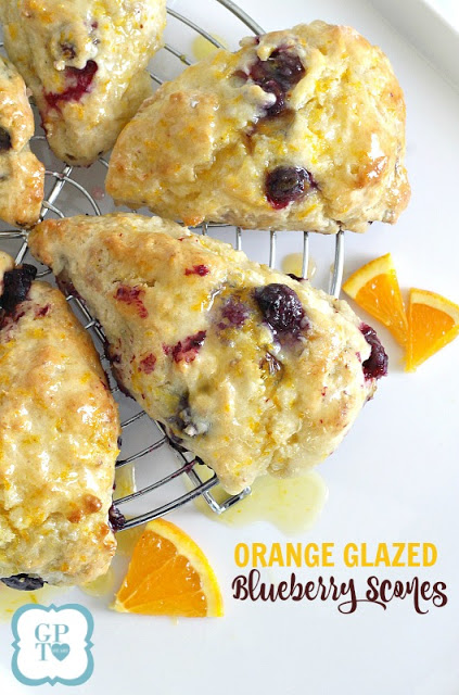 Delicious scones filled with blueberries with an orange or lemon glaze on top. Perfect for breakfast or at break time with your coffee or tea.