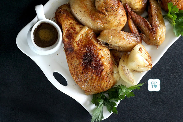 Easy recipe for moist and tender chicken, slow roasted in the oven with dry rub spices. 