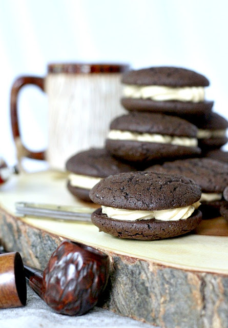 Chocolate Espresso Whoopie Pies are decadent and delicious. The dark chocolate cookie is rich and cake like. Or even brownie like, with a hint of coffee. Two cookies are sandwiched together with a frosting filling that is light and fluffy with more coffee flavor!