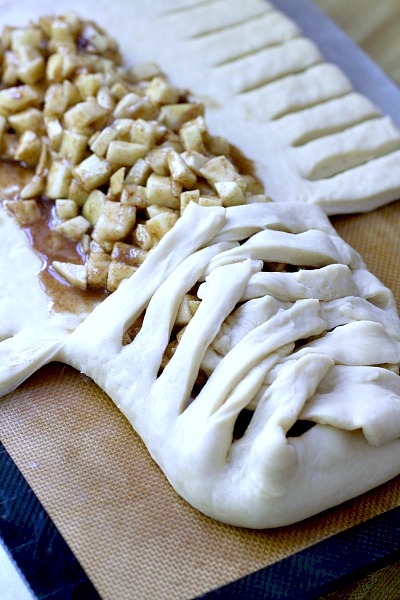 Frosted Apple Danish Braid made easy with dough from Bread Machine. Filled with cinnamon and apples and topped with frosting and toasted almonds. Breakfast or snack treat!