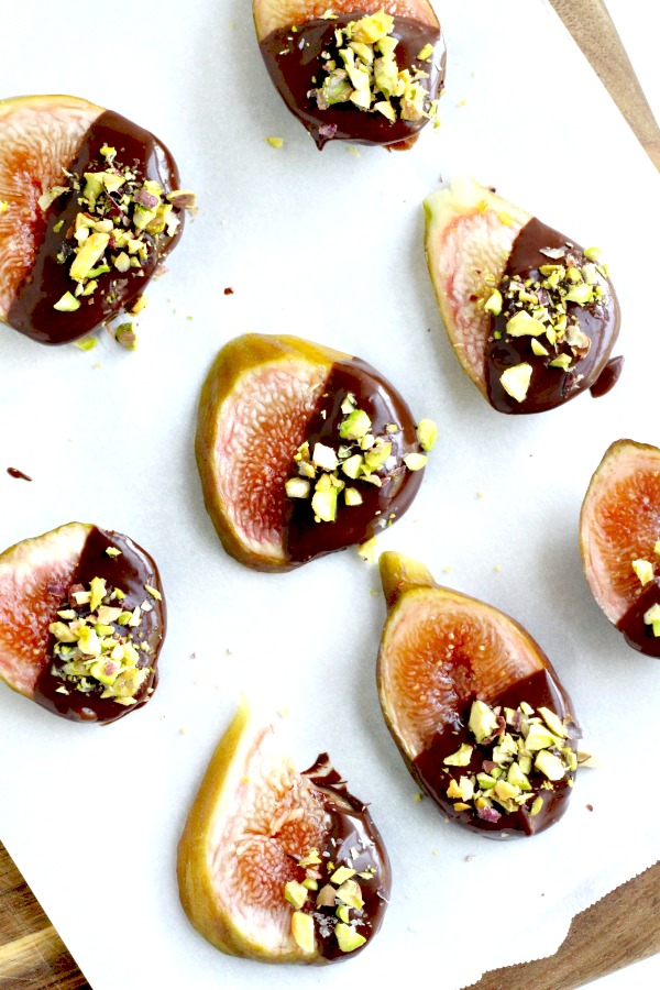 Easy and elegant sweet, after dinner dessert of fresh figs from backyard tree dipped in chocolate and topped with chopped pistachios.