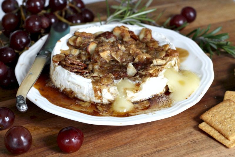 Creamy, buttery Tipsy Brie is the appetizer of choice when our friends get together. Warm and melty with a topping of brown sugar, sliced almonds and a little bourbon. It is easy to make using just four ingredients.