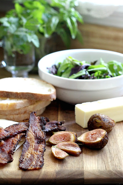 Take grilled cheese to another level with the addition of bacon, figs and greens. Great flavor combines with melt-y cheese and grilled to golden perfection.