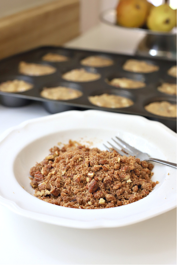 Making the crumb topping for pear, banana and walnut muffins.