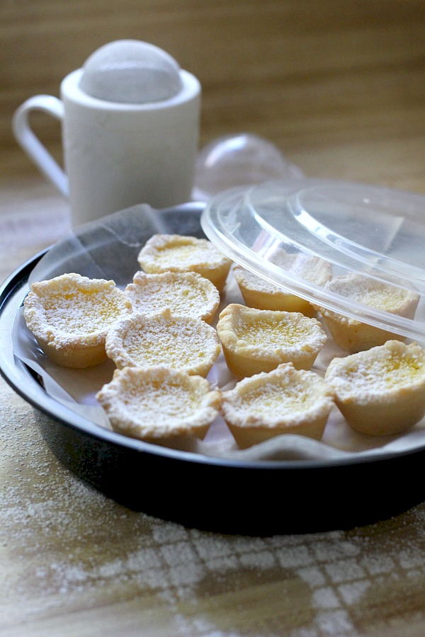 Lemon tartlets are tender little pie-like tartlets for every lemon lover! Easy how-to recipe for lemon tartlets with just the right amount of sweet and tart.