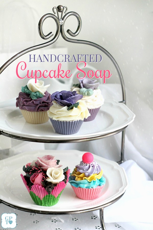 Handcrafted cupcake soap looks so real you might be tempted to take a bite. Scented with swirls of frosting and topped with cherries or pretty roses. They come gift-boxed, ready to give for the holidays to teachers, co-workers and friends. See how they are made and order link in post. Lovely in linen closet or to fragrance lingerie drawer. From Nancy's Garden Soap Co.