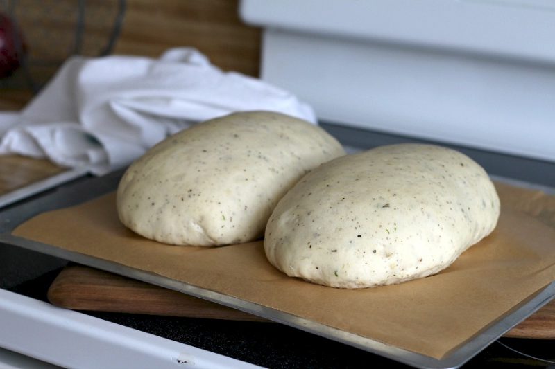 Parmesan, Cracked Pepper and Herbed Bread is full of flavor, slices beautifully and great for sandwiches or buttered and served with soup or salad. Easy recipe dough is made in a bread maker and shaped as desired. Allow to rise, bake and enjoy!