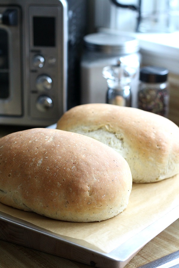 Parmesan, Cracked Pepper and Herbed Bread is full of flavor, slices beautifully and great for sandwiches or buttered and served with soup or salad. Easy recipe dough is made in a bread maker and shaped as desired. Allow to rise, bake and enjoy!