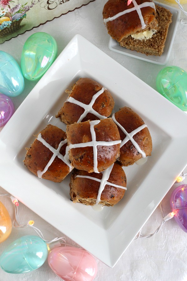 Hot Cross Buns are an Easter tradition and a lovely, sweet breakfast treat. Dough is made easily in a bread machine then shaped and baked in a dish. Frosting is piped on top in the shape of the cross. Perfect addition for brunch with hard-boiled, colored eggs.