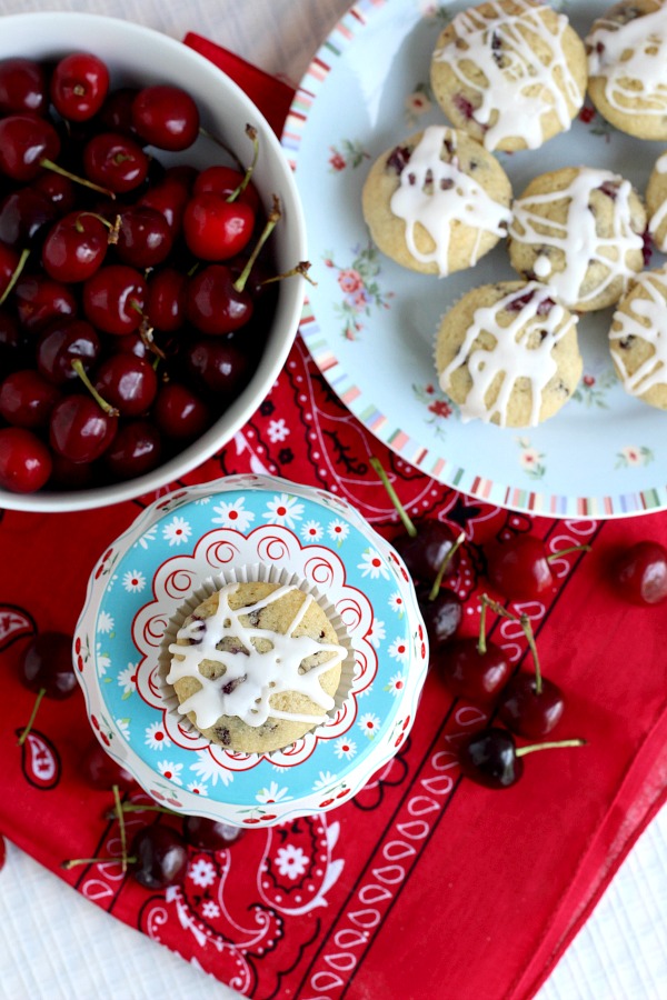 Both cherries and chocolate chips are folded into the batter of these delicious glazed Cherry Chocolate Chip Muffins. Perfect breakfast or snacking treat.