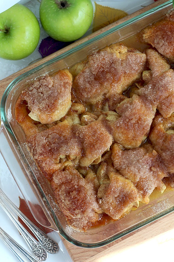 Super easy recipe for autumns favorite fruit, Apple Bundles are made with crescent rolls, cinnamon with a hint of orange. They smell heavenly and are perfect warm from the oven with a scoop of ice cream.