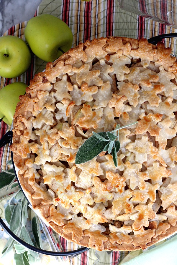 Pork and Apple Pie with sage is a delicious flavor combo of savory and a hint of sweetness in a flaky crust. Sliced apples are layered on top of a filling of seasoned ground pork making a lovely Sunday or weeknight dinner.