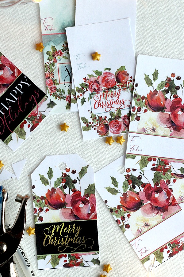 Pretty Holiday gift tags make presents look so festive. Christmas roses and holly have room to write recipient and givers name. Get your printable freebie.