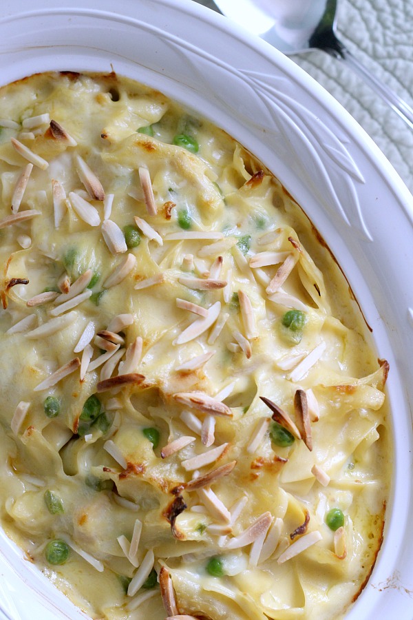 Tender egg noodles, chunks of chicken, bits of onion and bell pepper in a cheesy, creamy sauce and topped with crunchy almonds is what makes creamy chicken noodle casserole a most comforting dinner meal everyone loves.