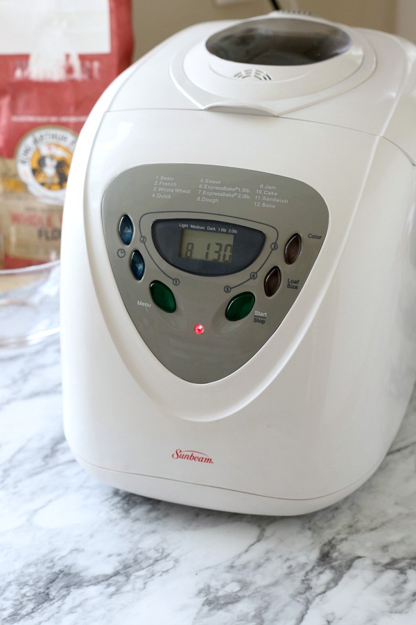 Easy recipe for delicious homemade honey whole wheat bread uses a bread machine to make the dough. Shape into loaves and bake. Perfect for slicing too.