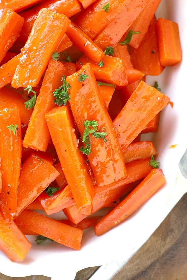 Colorful, elegant and delicious glazed carrots are quick and easy to make on the stove with just a few ingredients. A perfect & nutritious dinner side dish.