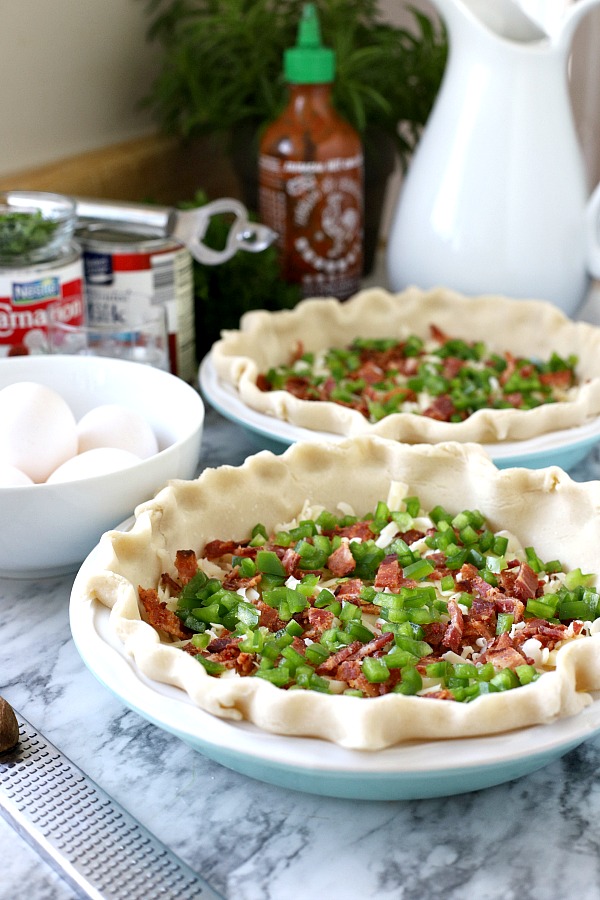 Prepping for a quiche Lorraine is quick and easy. Fill a crust with Swiss cheese, cooked bacon, a few veggies and pour in a milk and egg mixture. Pop in the oven and wait for a savory pie just as perfect for breakfast, brunch or dinner as it is for entertaining. A lovely Easter entrée!