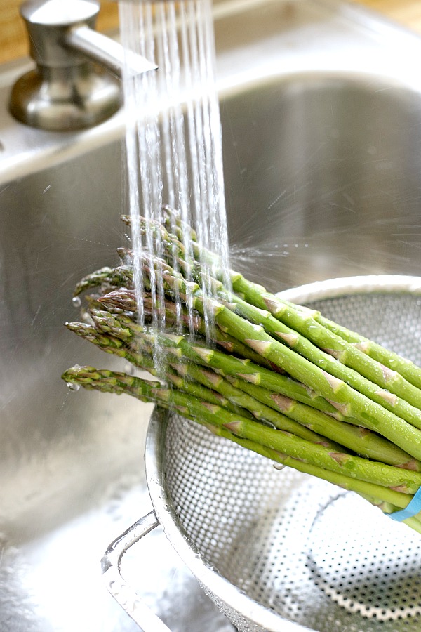 Fresh and delicious asparagus in a balsamic vinaigrette marinade is tender yet crunchy with a bright flavor from lemon zest. So easy to make with just a quick blanching. Pour on the salad dressing marinade and refrigerate until serving. A lovely Easter or brunch side dish.