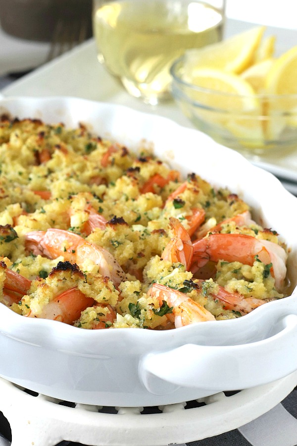 Elegant, delicious and so easy! Baked shrimp scampi is made by arranging shrimp in a dish and topping with a buttery herb mixture. Baked to hot and bubbly perfection. Try this easy recipe for your next dinner party.