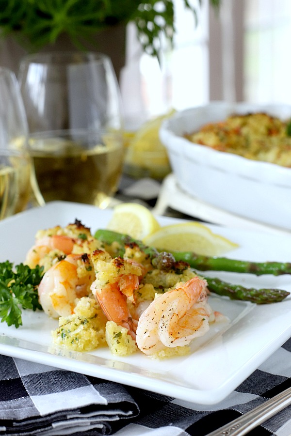 It couldn’t get any easier to make delicious baked shrimp scampi. Arranged in a baking dish, the shrimp are topped with a buttery herb mixture and popped into the oven until hot and bubbly.
