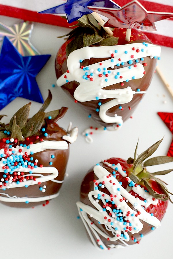 Chocolate covered strawberries are the perfect dessert for 4th of July or patriotic celebrations. Easy no-bake recipe for melting chocolate and decorating.