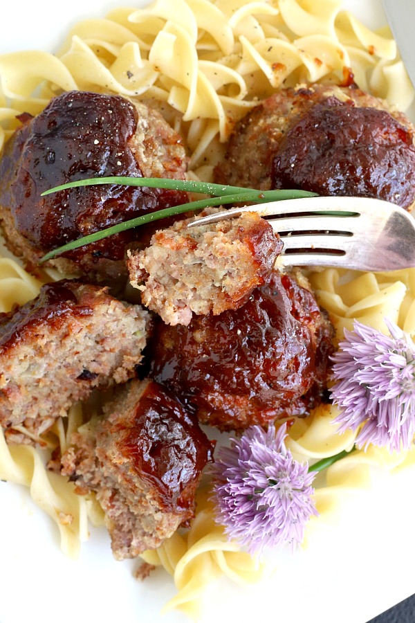 Easy recipe for baked ham balls using leftover ham and ground beef. Topped with barbecue sauce and baked for a flavorful weeknight dinner everyone will love.