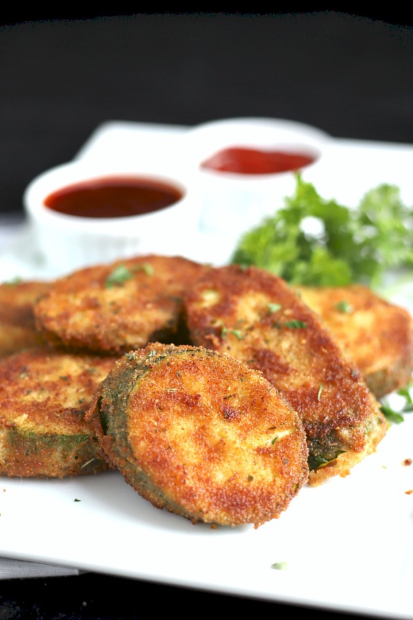 The crispy and delicious coating makes breaded fried zucchini a favorite appetizer or side dish. Just a few ingredients and a few minutes in the skillet until golden brown.