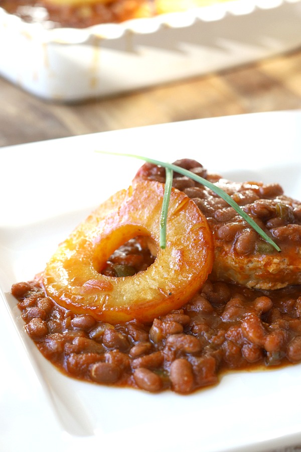 Hawaiian pork chops and baked beans are quick and easy to prepare. Pineapple, brown sugar and molasses give tons of sweet flavor. Great weeknight dinner or potluck dish!