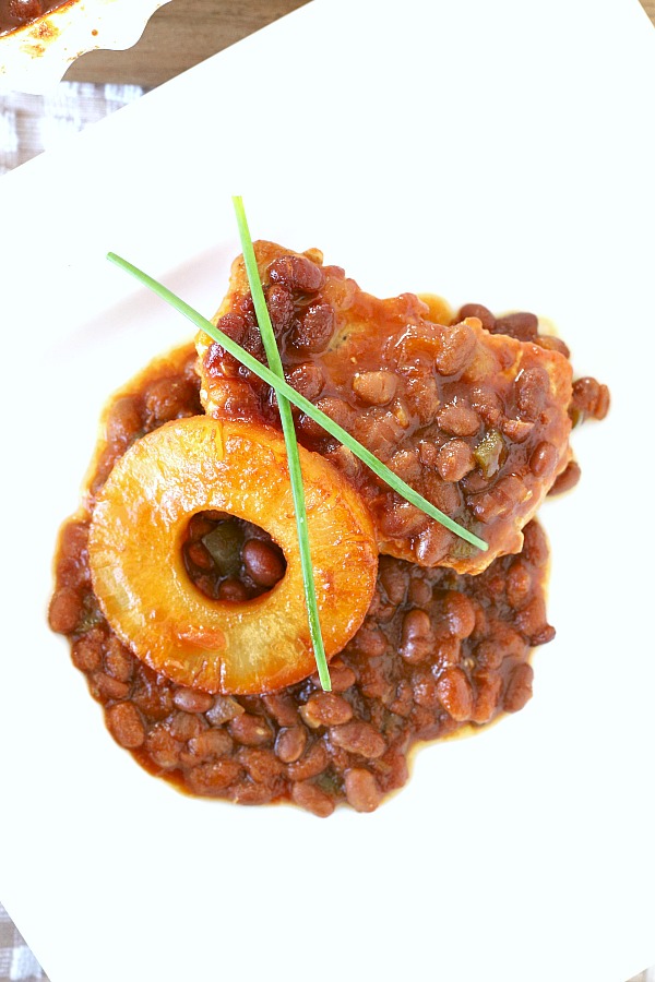 Serve Hawaiian pork chops and baked beans as an easy weeknight dinner or take to your next potluck. Pineapple, brown sugar and molasses gives tons of sweet flavor your family will love!