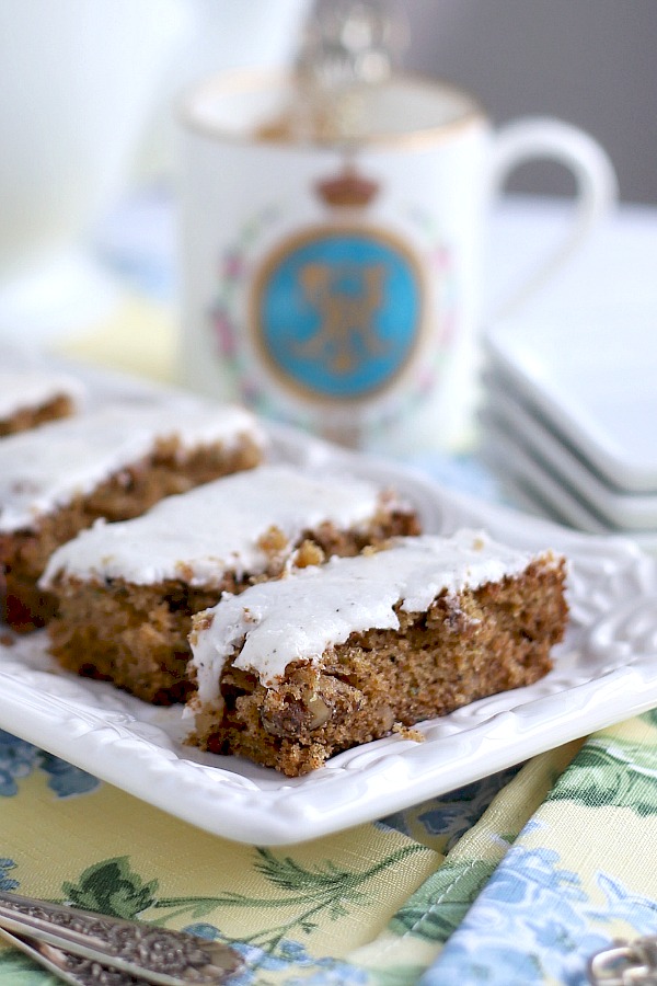 Perfect flavor combo in these zucchini bars with spice frosting are so moist and delicious. Easy recipe with cinnamon and a hint of cloves. A yummy dessert or coffee break treat.