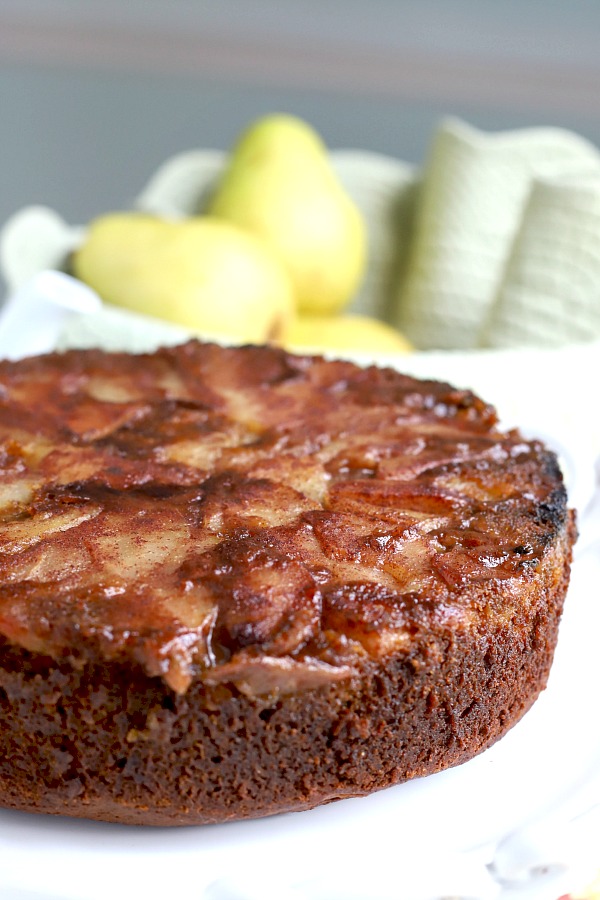 Spiced Pear Upside Down Cake is a deliciously moist cake with the wonderful flavors of cinnamon, cloves, ginger, nutmeg. Topped with caramelized pears and perfect fall or Thanksgiving dessert. 