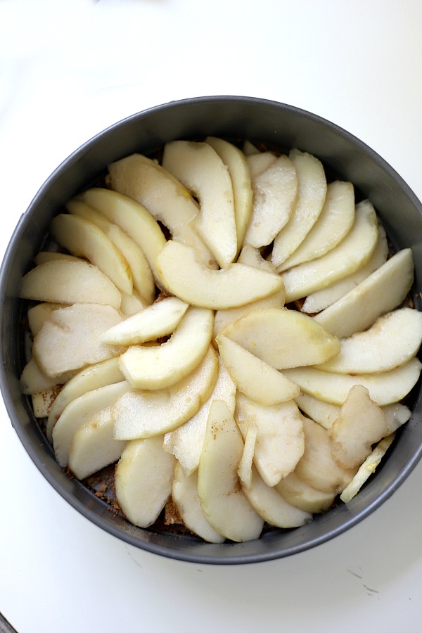 Easy step-by-step recipe for spiced pear upside down cake. Caramelized pears top a moist cake with wonderful spices so perfect for fall and Thanksgiving dessert.