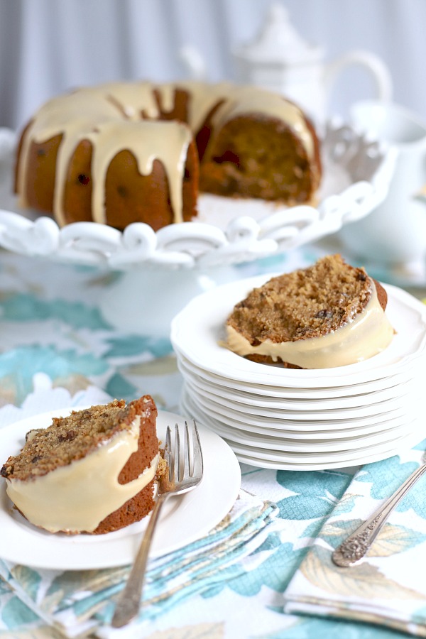 Applesauce cake, from and old-fashioned recipe is moist and delicious with a sweet caramel topping. A perfectly spiced fall dessert made in a Bundt pan.