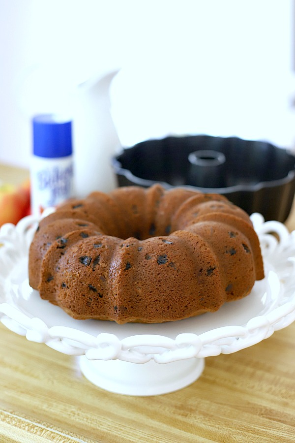 Moist and delicious, applesauce cake is amazing with a sweet, caramel topping! An easy, old-fashioned recipe perfectly spiced fall apple dessert.