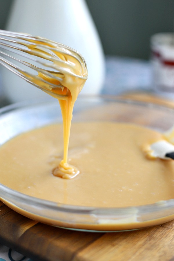 Easy oven method to make homemade caramel sauce quick and easy using sweetened condensed milk! Use on ice cream, apple pie, apple slices, gingerbread, bread pudding and cakes. Also makes a lovely food gift!