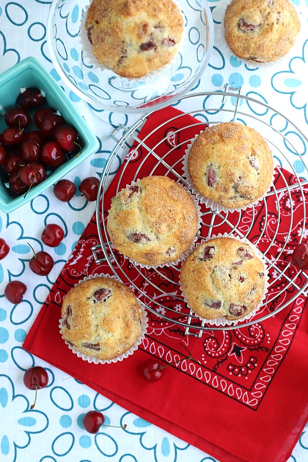 Bake a batch of cherry almond muffins for breakfast, snacking or teatime. Their cake-like texture filled with chunks of cherry and toasted almonds make them a hit! Easy recipe that goes together fast.