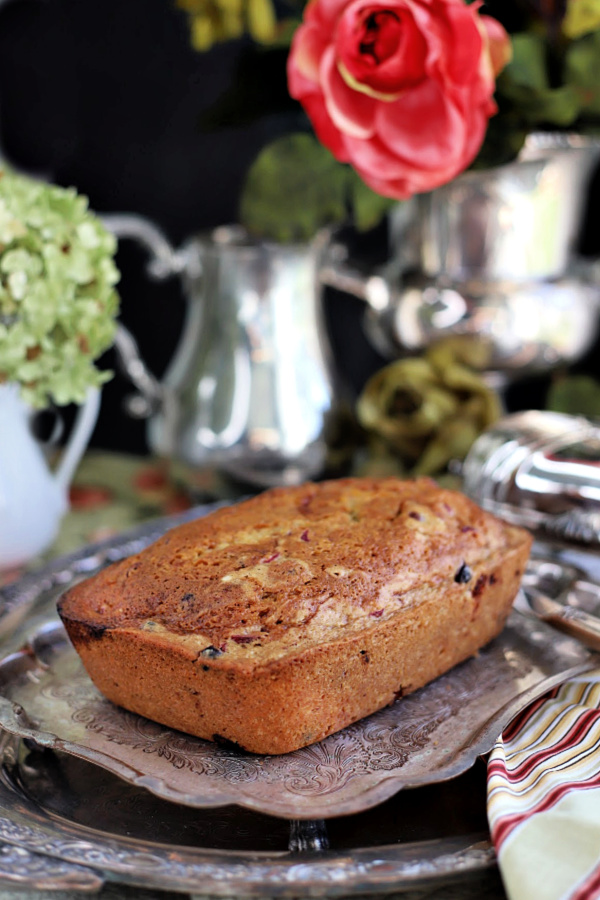 Serve with a sweet orange frosting or without, frosted apricot cranberry bread is a delicious side dish to Thanksgiving dinner. This easy quick bread recipe is filled with tart cranberries and swirls of sweet apricot jam making it moist and tasty.